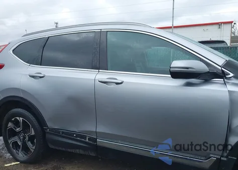 2017 Honda Cr-V Touring z USA, uszkodzony, nr VIN 5J6RW2H96HL019130